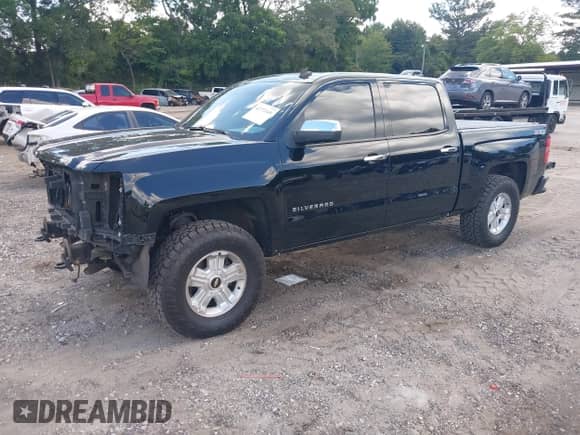 2014 Chevrolet Silverado 1500 LTZ with VIN 3GCUKSEC1EG311188, listed as a IAAI auction lot 42772149 with 141,404 mi miles and . Bid and sale history available at DreamBid. Image 18.