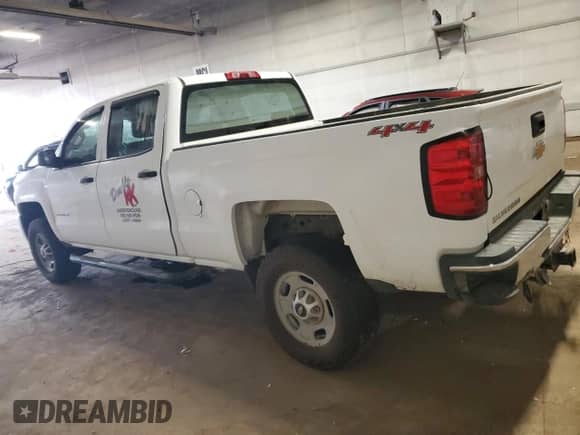 2015 Chevrolet Silverado 2500HD Work Truck z VIN 1GC1KUEG5FF652954, wystawiony jako Copart lot #56283235 z przebiegiem 235 014 mil mil oraz Szkoda całkowita • Salvage title. Historia ofert i sprzedaży dostępna na DreamBid. Obrazek 2.