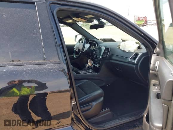 2021 Jeep Grand Cherokee Laredo E with VIN 1C4RJEAG8MC596881, listed as a IAAI auction lot 43050572 with 70,902 mi miles and . Bid and sale history available at DreamBid. Image 5.