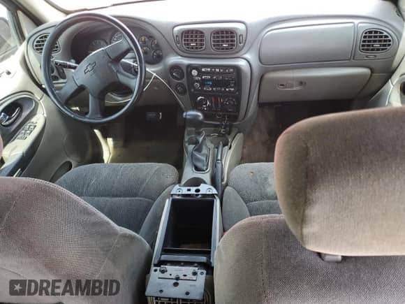 2002 Chevrolet TrailBlazer LT с VIN 1GNDT13S122371999, выставлен на аукционе Copart как лот 65365475 с пробегом 285 623 миль миль и На запчасти • Non repairable. История ставок и продаж доступна на DreamBid. Изображение 8.