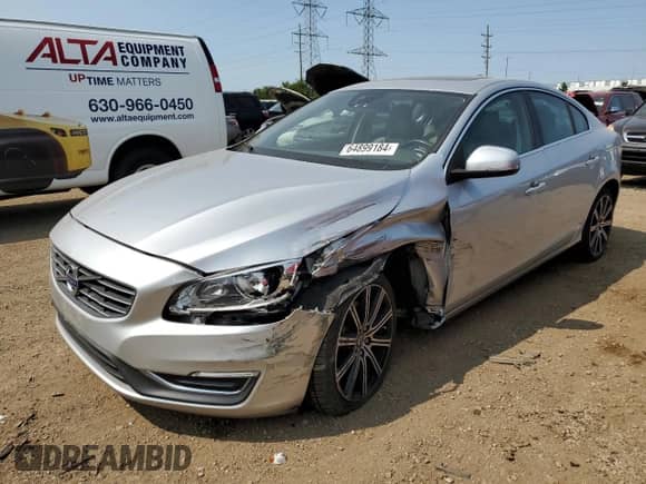 2014 Volvo S60 T6 with VIN YV1902FH4E2279443, listed as a Copart auction lot 69675964 with 88,993 mi miles and Salvage title. Bid and sale history available at DreamBid. Image 1.