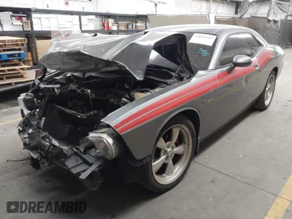 2012 Dodge Challenger R/T с VIN 2C3CDYBT1CH149903, выставлен на аукционе IAAI как лот 42031543 с пробегом 198 017 миль миль и . История ставок и продаж доступна на DreamBid. Изображение 2.