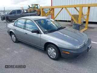 1997 Saturn SL с VIN 1G8ZH5285VZ117635, выставлен на аукционе IAAI как лот 42153929 с пробегом 193 224 миль миль и . История ставок и продаж доступна на DreamBid. Изображение 1.
