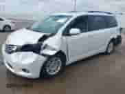 2015 Toyota Sienna XLE with VIN 5TDYK3DC1FS530972, listed as a IAAI auction lot 42896200 with 87,071 mi miles and . Bid and sale history available at DreamBid. Image 2.