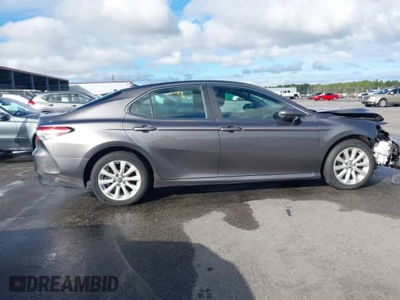 2019 Toyota Camry SE z VIN 4T1B11HK6KU831382, wystawiony jako IAAI lot #43426768 z przebiegiem 137 060 mil mil oraz . Historia ofert i sprzedaży dostępna na DreamBid. Obrazek 14.