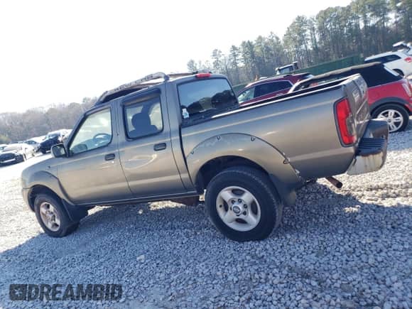 2001 Nissan Frontier SE with VIN 1N6ED27T01C347055, listed as a Copart auction lot 87753315 with 205,049 mi miles and Clean title. Bid and sale history available at DreamBid. Image 2.