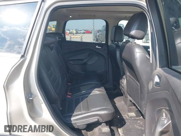 2017 Ford Escape Titanium with VIN 1FMCU9J9XHUD90656, listed as a IAAI auction lot 43216695 with 109,897 mi miles and . Bid and sale history available at DreamBid. Image 8.