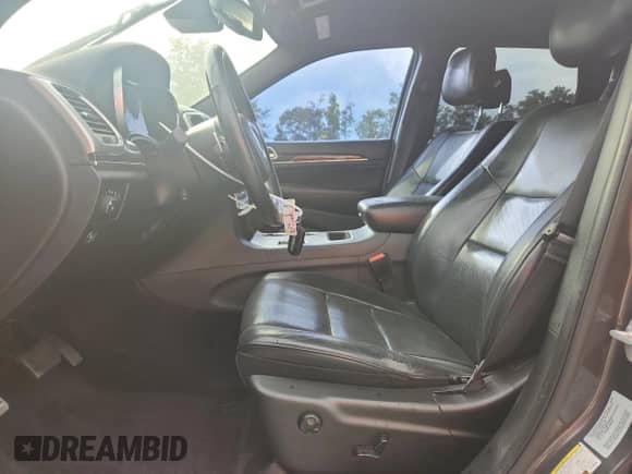 2015 Jeep Grand Cherokee Overland z VIN 1C4RJECG2FC199165, wystawiony jako Copart lot #66711265 z przebiegiem 182 093 mil mil oraz Szkoda całkowita • Salvage title. Historia ofert i sprzedaży dostępna na DreamBid. Obrazek 7.