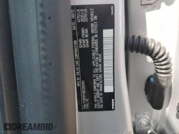 2014 Volvo S60 T5 z VIN YV1612FH9E2293161, wystawiony jako Copart lot #68771915 z przebiegiem 52 472 mil mil oraz Szkoda całkowita • Salvage title. Historia ofert i sprzedaży dostępna na DreamBid. Obrazek 12.