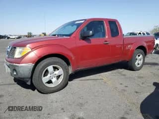 2006 Nissan Frontier XE with VIN 1N6BD06T76C453552, listed as a Copart auction lot 62901325 with 180,576 mi miles and Salvage title. Bid and sale history available at DreamBid. Image 1.