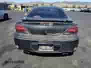 2000 Pontiac Grand Am GT z VIN 1G2NW52E3YC553038, wystawiony jako Copart lot #67668845 z przebiegiem 215 693 mil mil oraz Czysty tytuł • Clean title. Historia ofert i sprzedaży dostępna na DreamBid. Obrazek 6.