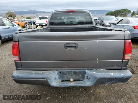 2002 Dodge Dakota с VIN 1B7GL12XX2S718443, выставлен на аукционе Copart как лот 84568934 с пробегом 122 127 миль миль и Чистый • Clean title. История ставок и продаж доступна на DreamBid. Изображение 6.