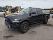 2016 Ram 1500 Rebel z VIN 1C6RR7YT4GS229923, wystawiony jako Copart lot #80774565 z przebiegiem 128 682 mil mil oraz Szkoda całkowita • Salvage title. Historia ofert i sprzedaży dostępna na DreamBid. Obrazek 1.