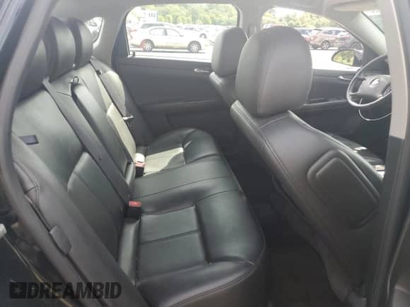 2011 Chevrolet Impala LTZ z VIN 2G1WC5EM6B1229213, wystawiony jako Copart lot #70545495 z przebiegiem 135 561 mil mil oraz Czysty tytuł • Clean title. Historia ofert i sprzedaży dostępna na DreamBid. Obrazek 10.