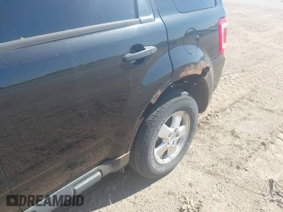 2011 Ford Escape XLT with VIN 1FMCU9DG6BKB40960, listed as a IAAI auction lot 42183576 with 259,427 mi miles and . Bid and sale history available at DreamBid. Image 6.