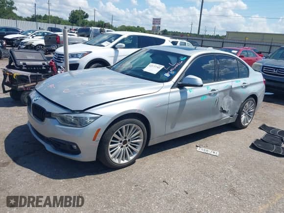 2016 BMW 3 Series 328i with VIN WBA8E9C54GK647433, listed as a IAAI auction lot 42977793 with 115,132 mi miles and . Bid and sale history available at DreamBid. Image 2.