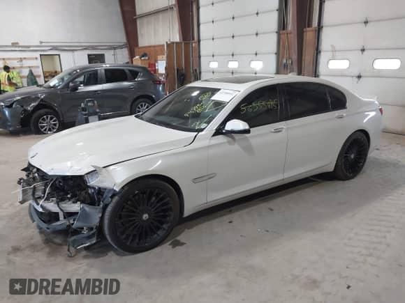 2013 BMW 7 Series 750Li with VIN WBAYE8C5XDDS15973, listed as a IAAI auction lot 42398942 with 74,793 mi miles and . Bid and sale history available at DreamBid. Image 18.