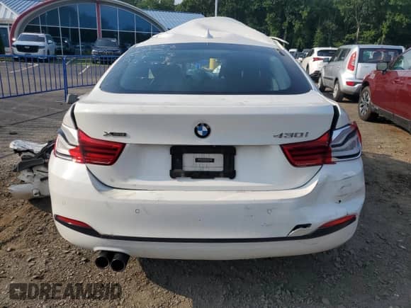 2018 BMW 4 Series 430i xDrive with VIN WBA4J3C57JBG95820, listed as a Copart auction lot 66998505 with Not provided miles and Non repairable. Bid and sale history available at DreamBid. Image 6.