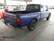 1995 Toyota Tacoma z VIN 4TAVN53F9SZ023310, wystawiony jako IAAI lot #43400554 z przebiegiem 311 607 mil mil oraz . Historia ofert i sprzedaży dostępna na DreamBid. Obrazek 4.