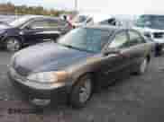 2003 Toyota Camry XLE with VIN 4T1BE30K83U654640, listed as a IAAI auction lot 43430984 with 277,826 mi miles and . Bid and sale history available at DreamBid. Image 2.