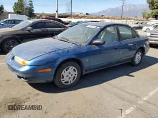 2001 Saturn SL with VIN 1G8ZF52861Z275529, listed as a Copart auction lot 74153154 with 171,272 mi miles and Clean title. Bid and sale history available at DreamBid. Image 1.