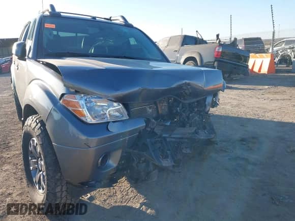 2020 Nissan Frontier Pro-4X with VIN 1N6ED0EB1LN708265, listed as a IAAI auction lot 41398914 with 98,665 mi miles and . Bid and sale history available at DreamBid. Image 6.