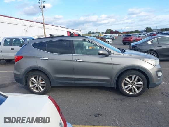2013 Hyundai Santa Fe Sport z VIN 5XYZUDLAXDG039119, wystawiony jako IAAI lot #43524581 z przebiegiem 331 501 mil mil oraz . Historia ofert i sprzedaży dostępna na DreamBid. Obrazek 13.
