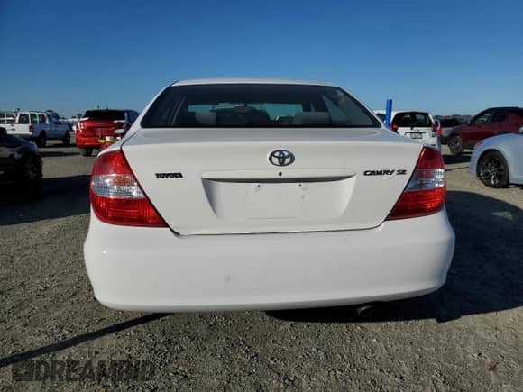 2004 Toyota Camry LE with VIN 4T1BE32K14U359409, listed as a Copart auction lot 82591815 with 114,439 mi miles and Salvage title. Bid and sale history available at DreamBid. Image 6.
