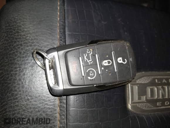 2020 Ram 1500 Longhorn with VIN 1C6SRFKT1LN275397, listed as a IAAI auction lot 42733634 with 101,019 mi miles and . Bid and sale history available at DreamBid. Image 11.