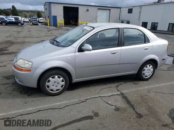 2006 Chevrolet Aveo LS с VIN KL1TD56696B521149, выставлен на аукционе Copart как лот 51381705 с пробегом 98 709 миль миль и Чистый • Clean title. История ставок и продаж доступна на DreamBid. Изображение 1.