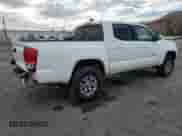 2016 Toyota Tacoma SR5 with VIN 5TFAX5GNXGX053627, listed as a Copart auction lot 82297585 with 80,982 mi miles and Salvage title. Bid and sale history available at DreamBid. Image 3.