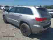 2016 Jeep Grand Cherokee Laredo with VIN 1C4RJFAG6GC400852, listed as a IAAI auction lot 43128932 with 219,285 mi miles and . Bid and sale history available at DreamBid. Image 3.