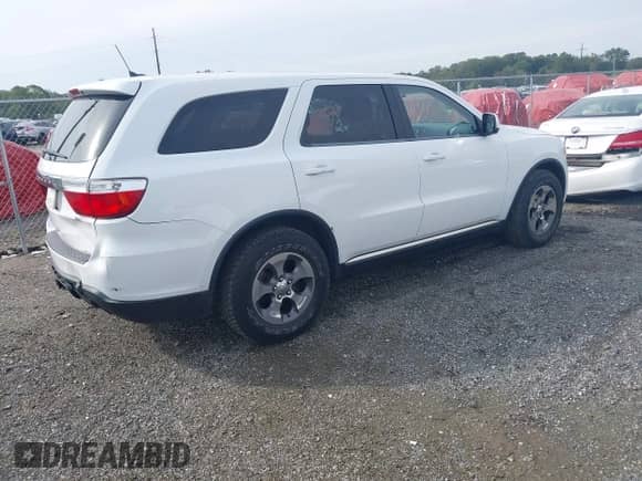 2013 Dodge Durango SXT with VIN 1C4RDHAG0DC693064, listed as a IAAI auction lot 43300866 with 244,392 mi miles and . Bid and sale history available at DreamBid. Image 4.