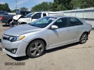2012 Toyota Camry SE with VIN 4T1BK1FK5CU013126, listed as a Copart auction lot 63444185 with 207,772 mi miles and Salvage title. Bid and sale history available at DreamBid. Image 1.
