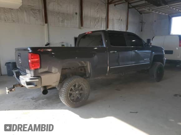 2015 Chevrolet Silverado 2500HD LTZ z VIN 1GC1KWE88FF631410, wystawiony jako Copart lot #65878395 z przebiegiem 118 963 mil mil oraz Szkoda całkowita • Salvage title. Historia ofert i sprzedaży dostępna na DreamBid. Obrazek 3.