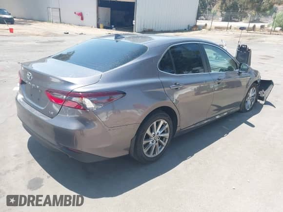 2023 Toyota Camry LE z VIN 4T1C11AK8PU106694, wystawiony jako IAAI lot #42902448 z przebiegiem 100 034 mil mil oraz . Historia ofert i sprzedaży dostępna na DreamBid. Obrazek 4.
