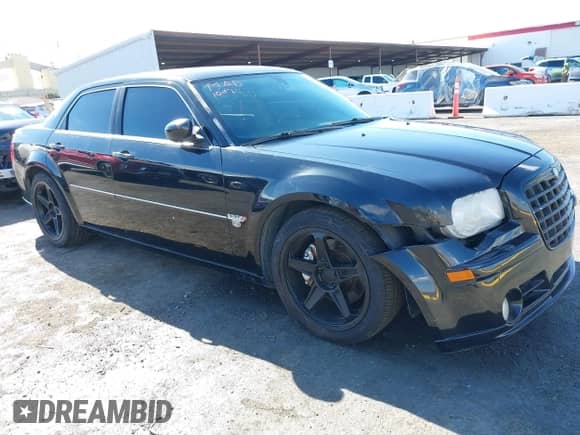 2006 Chrysler 300 C SRT-8 with VIN 2C3LA73W86H388896, listed as a IAAI auction lot 40599030 with 152,547 mi miles and . Bid and sale history available at DreamBid. Image 1.