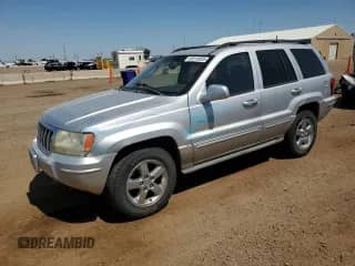 2004 Jeep Grand Cherokee Overland с VIN 1J8GW68J24C399858, выставлен на аукционе Copart как лот 69518935 с пробегом 122 800 миль миль и Чистый • Clean title. История ставок и продаж доступна на DreamBid. Изображение 1.