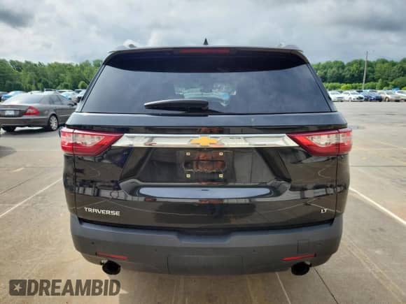 2018 Chevrolet Traverse LT с VIN 1GNERHKW9JJ112486, выставлен на аукционе Copart как лот 61333655 с пробегом 120 681 миль миль и Списание • Salvage title. История ставок и продаж доступна на DreamBid. Изображение 6.