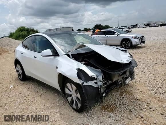 2023 Tesla Model Y Long Range with VIN 7SAYGDEE8PA067712, listed as a Copart auction lot 63824464 with 30,863 mi miles and Salvage title. Bid and sale history available at DreamBid. Image 12.