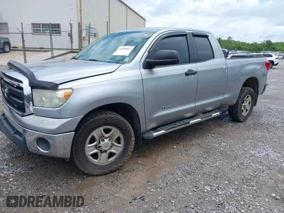 2012 Toyota Tundra z VIN 5TFRU5F14CX027982, wystawiony jako IAAI lot #42369647 z przebiegiem 169 286 mil mil oraz . Historia ofert i sprzedaży dostępna na DreamBid. Obrazek 17.