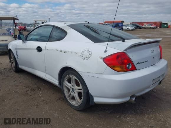 2003 Hyundai Tiburon GT с VIN KMHHN65FX3U034914, выставлен на аукционе IAAI как лот 41299314 с пробегом 204 378 миль миль и . История ставок и продаж доступна на DreamBid. Изображение 3.