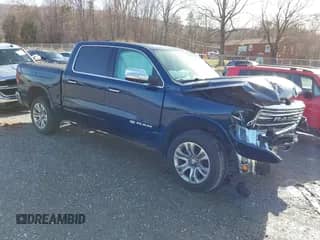 2020 Ram 1500 Longhorn with VIN 1C6SRFKT5LN185329, listed as a IAAI auction lot 41709711 with 78,586 mi miles and . Bid and sale history available at DreamBid. Image 1.