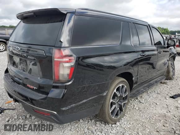 2021 Chevrolet Suburban RST с VIN 1GNSKEKD5MR194467, выставлен на аукционе Copart как лот 59403815 с пробегом 76 408 миль миль и Списание • Salvage title. История ставок и продаж доступна на DreamBid. Изображение 3.