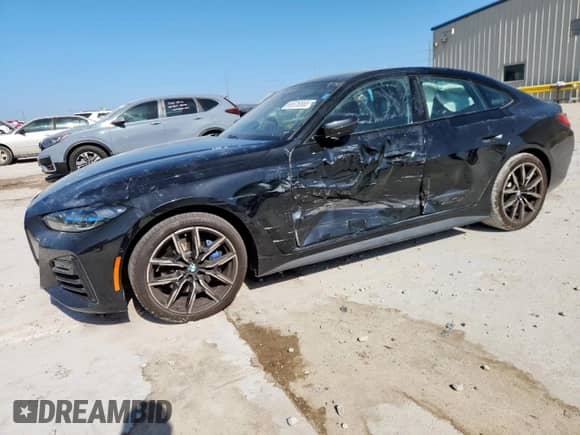 2022 BMW 4 Series 430i с VIN WBA63AV05NFM22721, выставлен на аукционе Copart как лот 66526565 с пробегом 38 738 миль миль и Списание • Salvage title. История ставок и продаж доступна на DreamBid. Изображение 1.