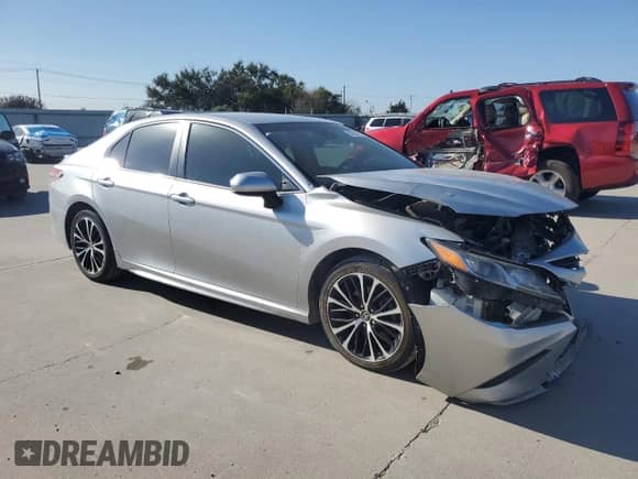 2018 Toyota Camry SE с VIN 4T1B11HK2JU002582, выставлен на аукционе Copart как лот 82613755 с пробегом 133 835 миль миль и Списание • Salvage title. История ставок и продаж доступна на DreamBid. Изображение 4.