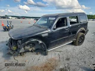 2008 Dodge Nitro SXT with VIN 1D8GT28K58W104310, listed as a Copart auction lot 65250315 with 253,366 mi miles and Salvage title. Bid and sale history available at DreamBid. Image 1.