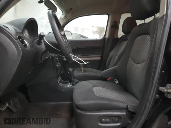 2009 Chevrolet HHR 1LT z VIN 3GNCA23B49S511825, wystawiony jako Copart lot #71018294 z przebiegiem 203 547 mil mil oraz Czysty tytuł • Clean title. Historia ofert i sprzedaży dostępna na DreamBid. Obrazek 7.