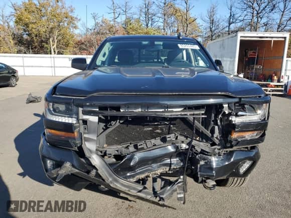 2016 Chevrolet Silverado 1500 LT с VIN 1GCVKREC9GZ389976, выставлен на аукционе Copart как лот 85265485 с пробегом 52 596 миль миль и Списание • Salvage title. История ставок и продаж доступна на DreamBid. Изображение 5.