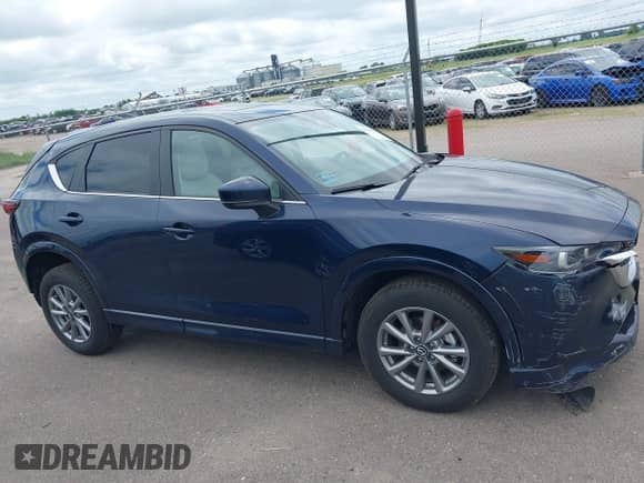 2024 Mazda CX-5 S Preferred z VIN JM3KFBCL2R0446390, wystawiony jako IAAI lot #42624381 z przebiegiem 21 293 mil mil oraz . Historia ofert i sprzedaży dostępna na DreamBid. Obrazek 14.
